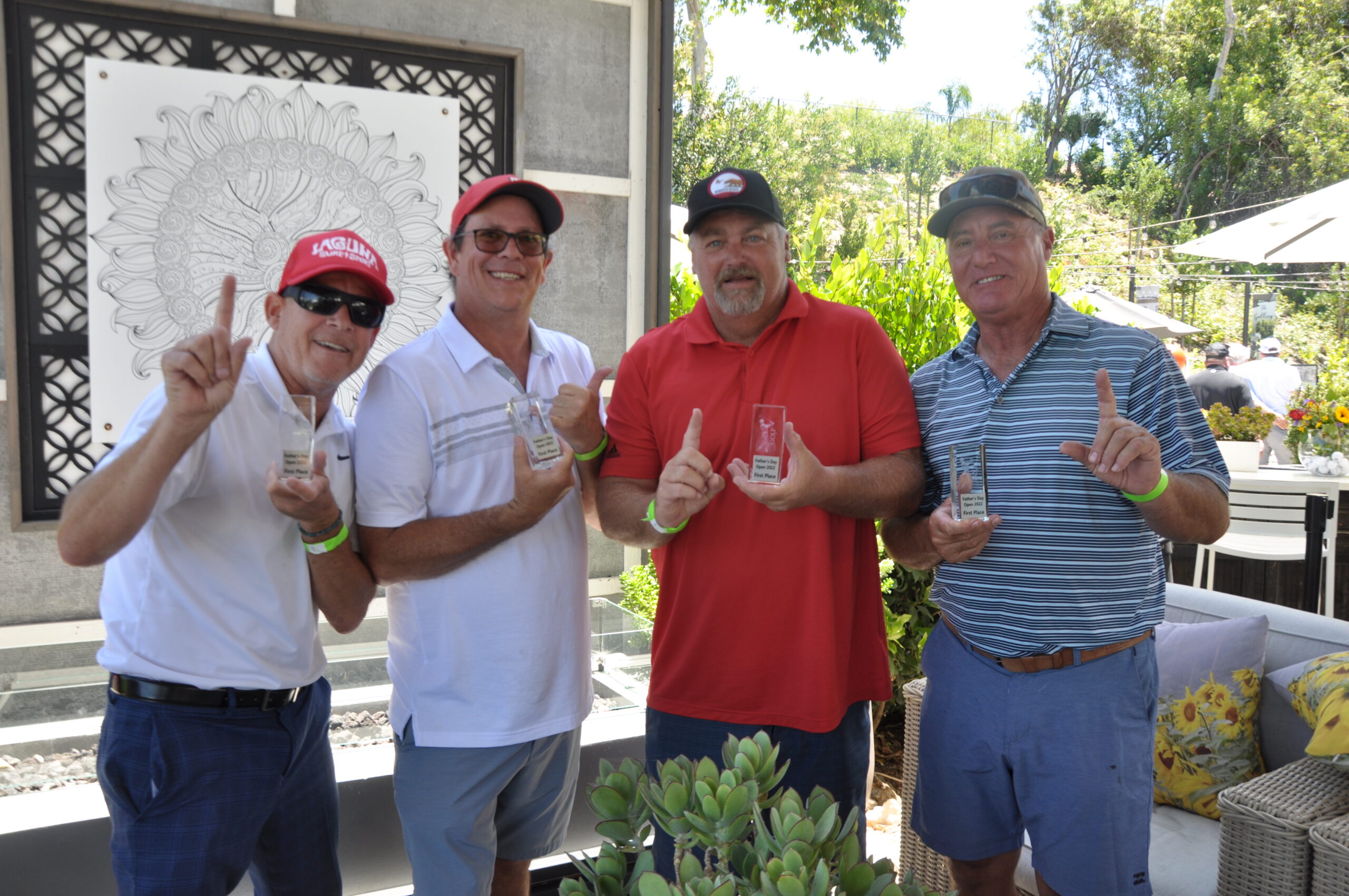 Men with trophies